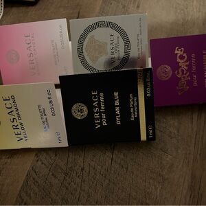 Versace Fragrance Collection with Pink and Purple Accents